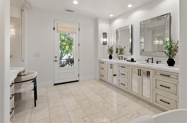 full bath with double vanity, visible vents, recessed lighting, and a sink