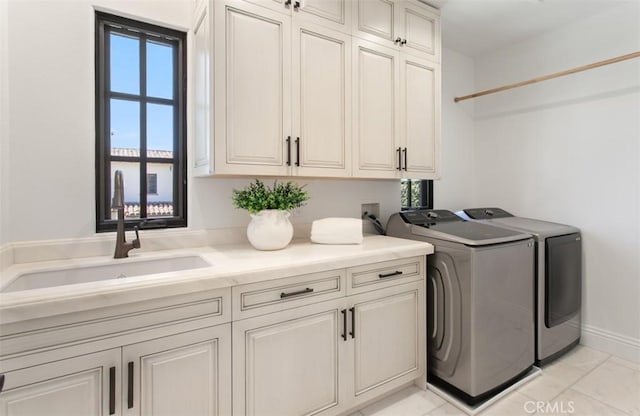 21 Observatory, Newport Coast, CA 92657 - laundry area featuring cabinet space and washer and dryer