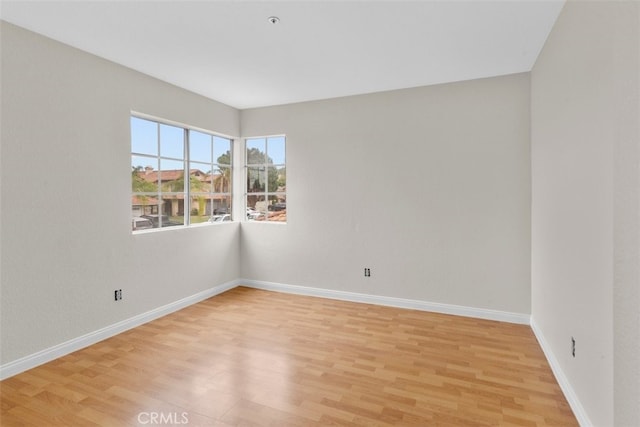 15767 San Roque Rd, Fontana, CA 92337 - empty room featuring light wood finished floors and baseboards