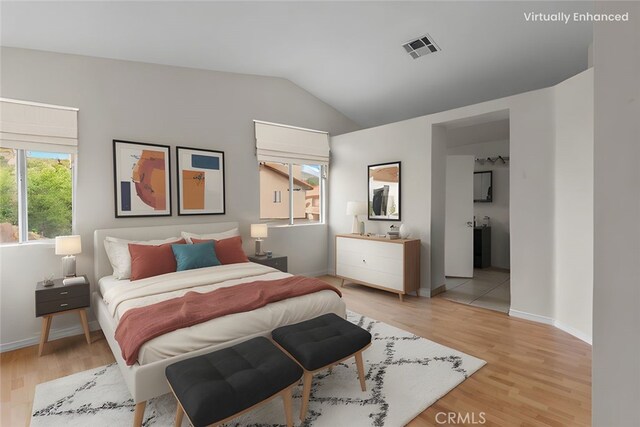 15767 San Roque Rd, Fontana, CA 92337 - bedroom featuring vaulted ceiling, light wood-type flooring, and baseboards