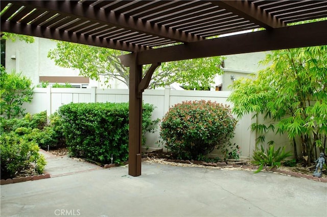 view of patio with a pergola and a fenced backyard