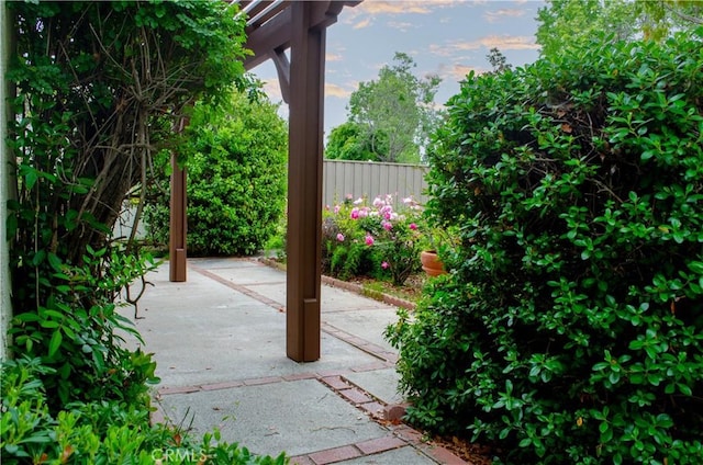 view of patio / terrace featuring fence