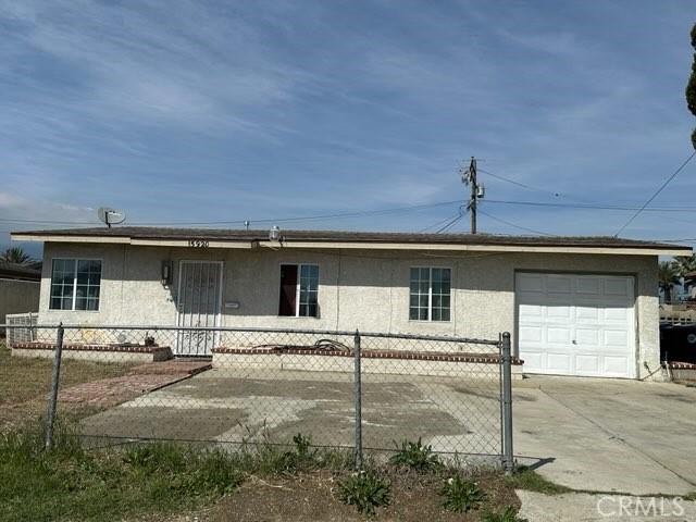 15920 Mission Ave, Fontana, CA 92335 - single story home featuring an attached garage, stucco siding, and fence