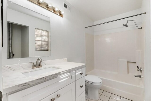 1044 Calle Del Cerro Unit 301, San Clemente, CA 92672 - bathroom featuring tile patterned floors, shower / bathtub combination, visible vents, toilet, and vanity