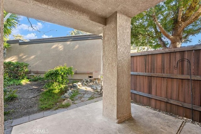 1044 Calle Del Cerro Unit 301, San Clemente, CA 92672 - view of patio with fence
