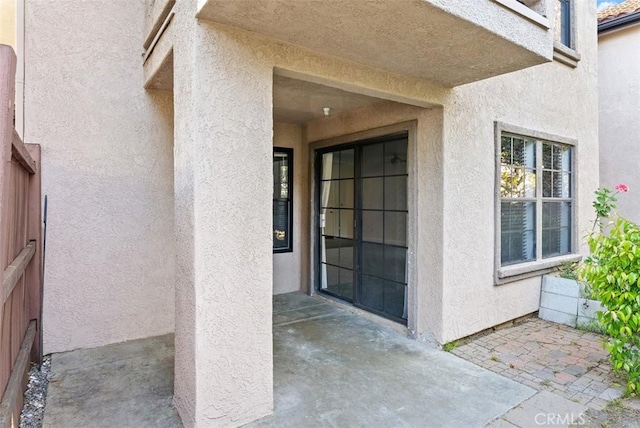 1044 Calle Del Cerro Unit 301, San Clemente, CA 92672 - doorway to property with a patio area and stucco siding