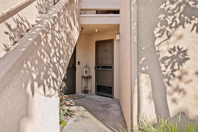 1044 Calle Del Cerro Unit 301, San Clemente, CA 92672 - property entrance featuring stucco siding