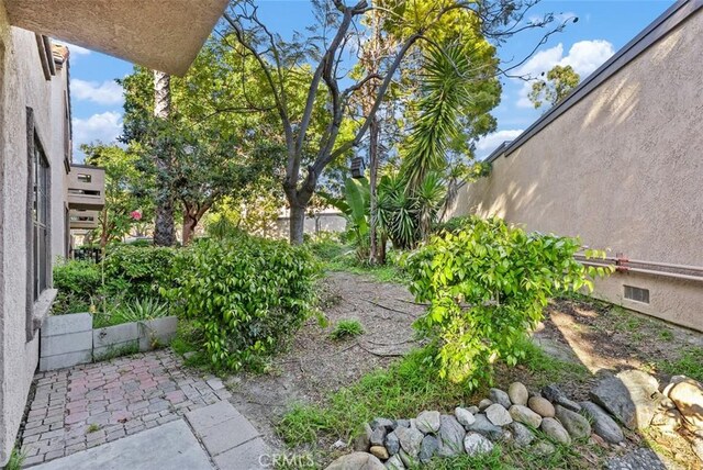 1044 Calle Del Cerro Unit 301, San Clemente, CA 92672 - view of yard featuring a patio area