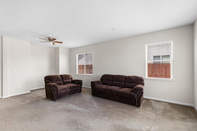 930 Travertine Way, Atwater, CA 95301 - carpeted living area with baseboards and a ceiling fan