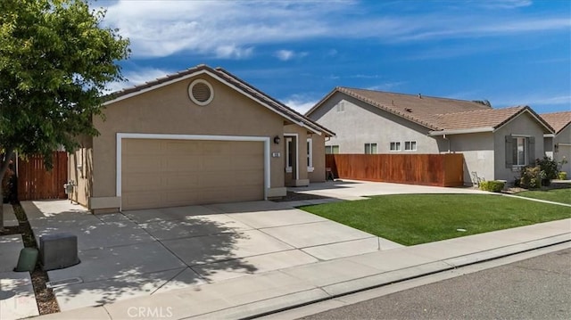 930 Travertine Way, Atwater, CA 95301 - single story home featuring driveway, fence, a garage, and stucco siding