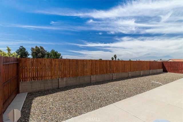 930 Travertine Way, Atwater, CA 95301 - view of yard featuring a patio area and a fenced backyard