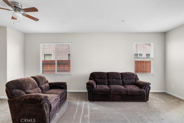 930 Travertine Way, Atwater, CA 95301 - carpeted living area featuring a healthy amount of sunlight and baseboards