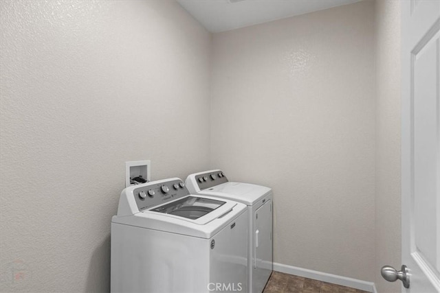 930 Travertine Way, Atwater, CA 95301 - washroom featuring a textured wall, washing machine and clothes dryer, laundry area, and baseboards