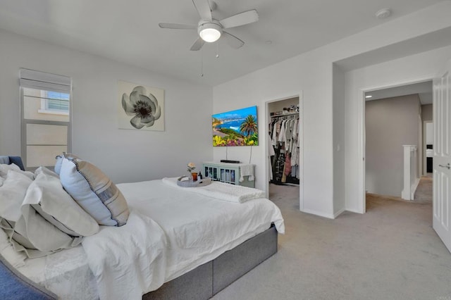 1132 Cherry Tree Ln, Vista, CA 92084 - bedroom with light carpet, a spacious closet, and a ceiling fan