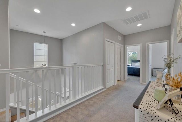 1132 Cherry Tree Ln, Vista, CA 92084 - corridor with carpet floors, recessed lighting, and a chandelier