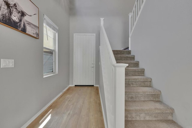 1132 Cherry Tree Ln, Vista, CA 92084 - stairs featuring hardwood / wood-style floors and baseboards