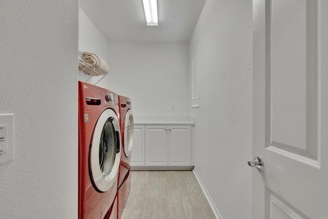 1132 Cherry Tree Ln, Vista, CA 92084 - laundry area with washing machine and dryer and cabinet space