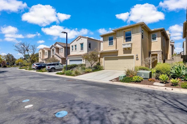 1132 Cherry Tree Ln, Vista, CA 92084 - view of front of home featuring a residential view, stucco siding, a garage, and concrete driveway