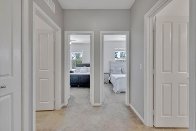 1132 Cherry Tree Ln, Vista, CA 92084 - hallway with light carpet and baseboards