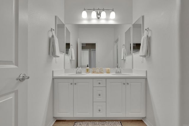 1132 Cherry Tree Ln, Vista, CA 92084 - bathroom with double vanity and wood finished floors