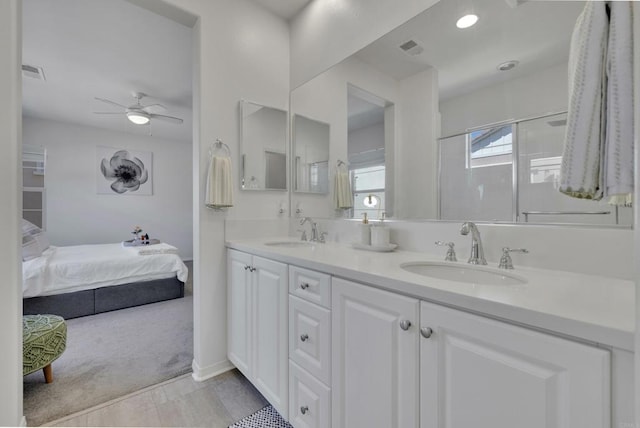 1132 Cherry Tree Ln, Vista, CA 92084 - ensuite bathroom with double vanity, a ceiling fan, and a shower with shower door