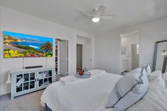1132 Cherry Tree Ln, Vista, CA 92084 - carpeted bedroom with ensuite bath and a ceiling fan