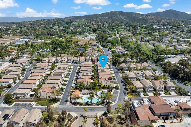 1132 Cherry Tree Ln, Vista, CA 92084 - aerial view of property's location featuring mountains and nearby suburban area