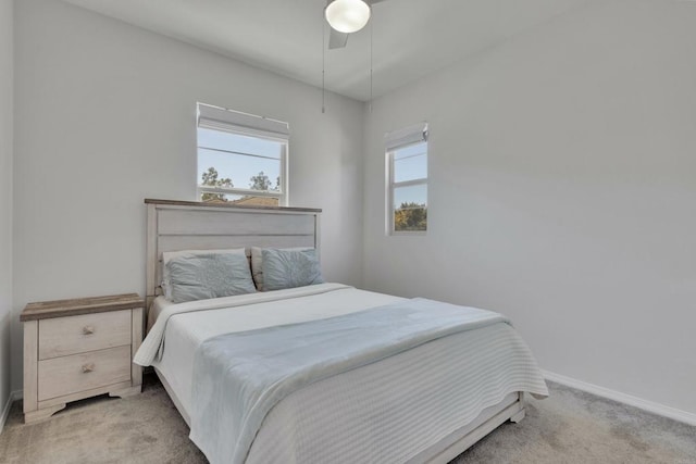 1132 Cherry Tree Ln, Vista, CA 92084 - carpeted bedroom with baseboards and ceiling fan