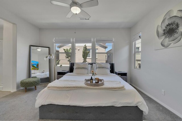 1132 Cherry Tree Ln, Vista, CA 92084 - carpeted bedroom with baseboards and ceiling fan