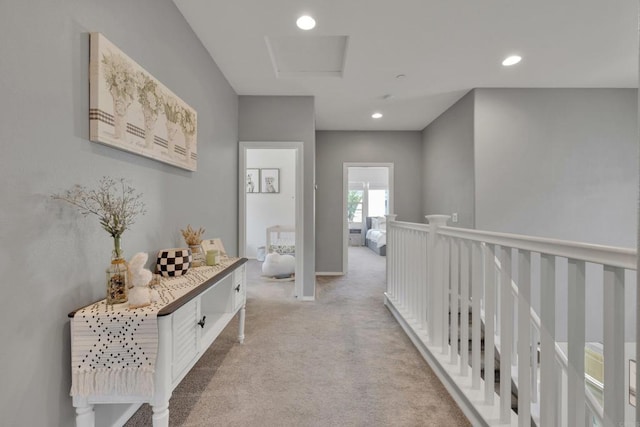 1132 Cherry Tree Ln, Vista, CA 92084 - hallway with light colored carpet, attic access, and recessed lighting
