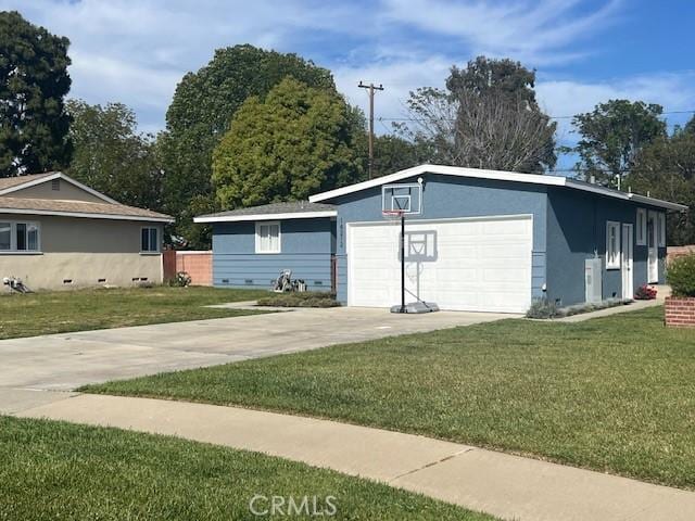 garage with concrete driveway