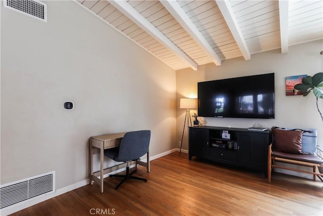 office area with light wood finished floors, visible vents, wooden ceiling, and vaulted ceiling with beams