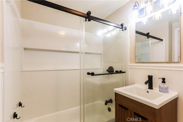 full bath featuring enclosed tub / shower combo and vanity