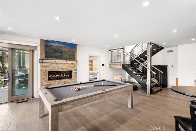 496 N State Highway 173, Lake Arrowhead, CA 92352 - recreation room featuring pool table, wood finished floors, recessed lighting, and a stone fireplace