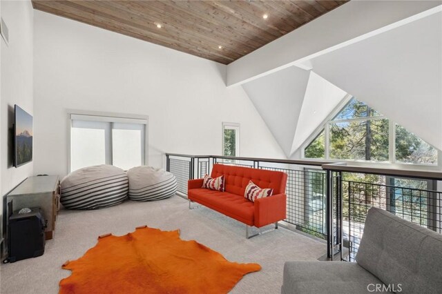 496 N State Highway 173, Lake Arrowhead, CA 92352 - carpeted living room featuring high vaulted ceiling and a wood ceiling with exposed beams
