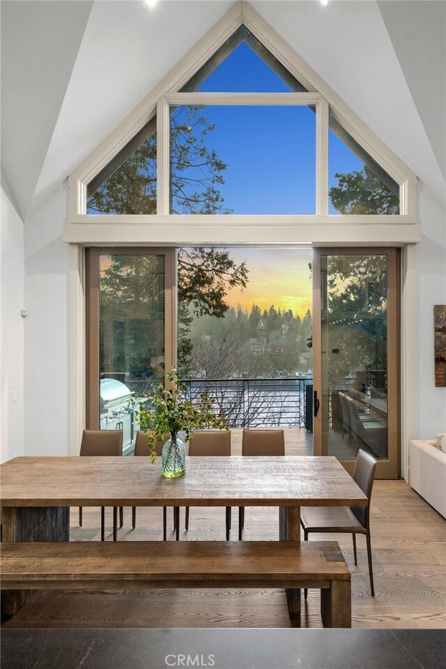 496 N State Highway 173, Lake Arrowhead, CA 92352 - dining space featuring plenty of natural light, high vaulted ceiling, and light wood-type flooring