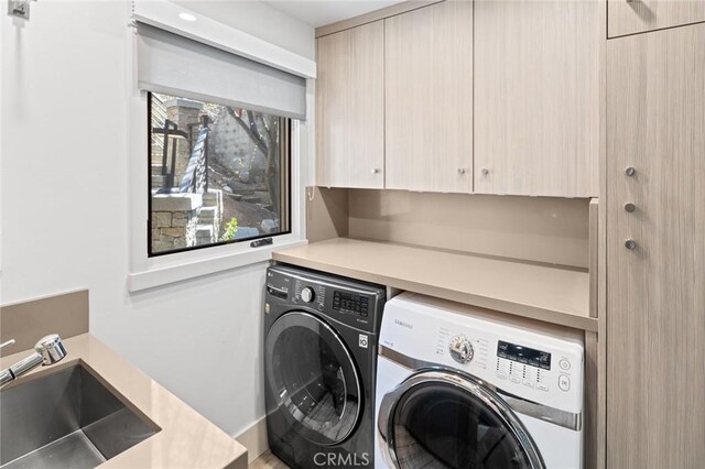 496 N State Highway 173, Lake Arrowhead, CA 92352 - laundry room with washing machine and clothes dryer and cabinet space