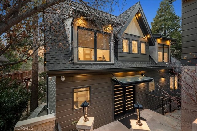 496 N State Highway 173, Lake Arrowhead, CA 92352 - back of property with a shingled roof