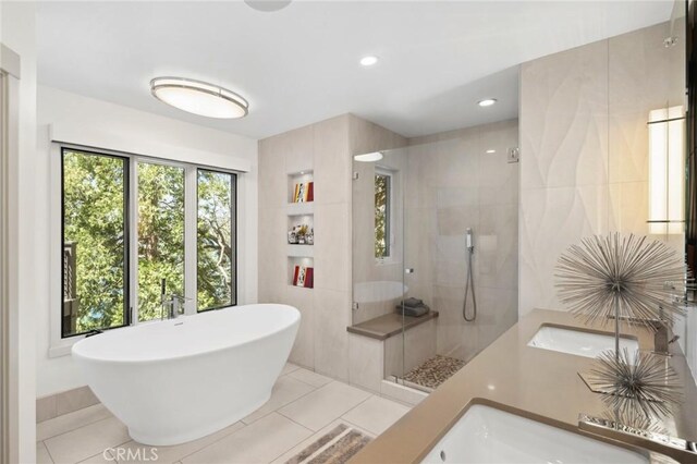496 N State Highway 173, Lake Arrowhead, CA 92352 - bathroom with a freestanding bath, tile patterned floors, a stall shower, tile walls, and recessed lighting