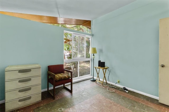 1768 Wright St, Pomona, CA 91766 - living area featuring baseboards, plenty of natural light, and vaulted ceiling