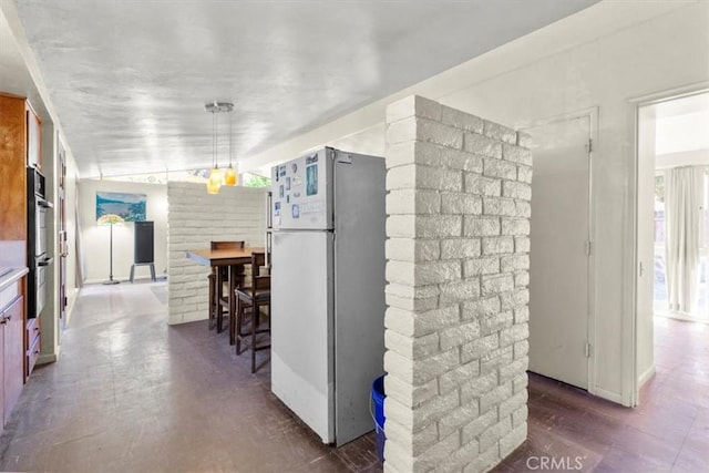 1768 Wright St, Pomona, CA 91766 - kitchen featuring freestanding refrigerator and double oven