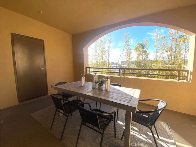 view of patio featuring a balcony