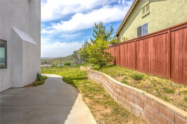 11834 Greenbluff Way, Yucaipa, CA 92399 - view of yard featuring a patio area