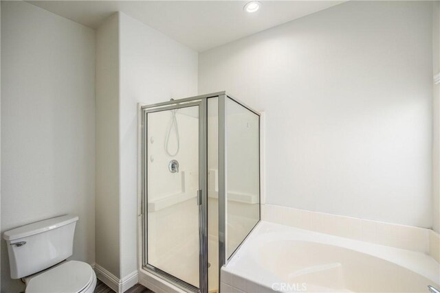 11834 Greenbluff Way, Yucaipa, CA 92399 - full bathroom featuring a bath, a shower stall, and recessed lighting
