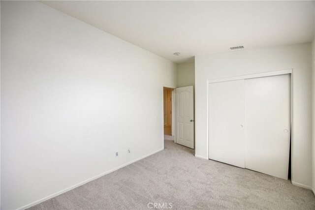 11834 Greenbluff Way, Yucaipa, CA 92399 - unfurnished bedroom featuring light carpet and a closet
