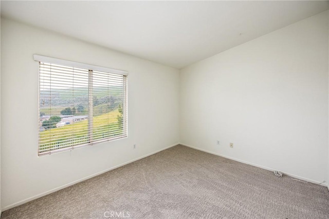 11834 Greenbluff Way, Yucaipa, CA 92399 - unfurnished room with light colored carpet and baseboards