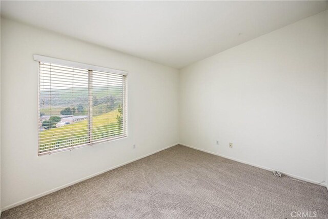 11834 Greenbluff Way, Yucaipa, CA 92399 - unfurnished room with light carpet and baseboards