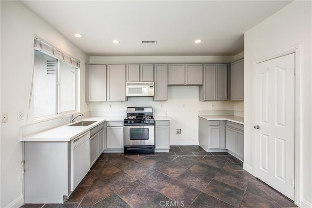 11834 Greenbluff Way, Yucaipa, CA 92399 - kitchen featuring white appliances, gray cabinets, baseboards, a sink, and recessed lighting