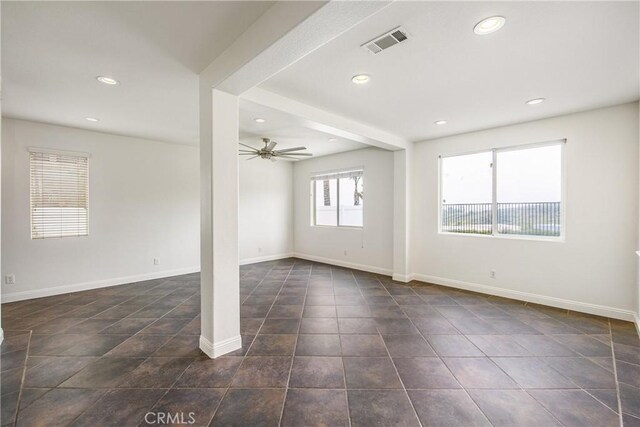11834 Greenbluff Way, Yucaipa, CA 92399 - empty room with ceiling fan, recessed lighting, and dark tile patterned floors