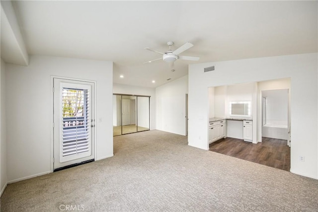 11834 Greenbluff Way, Yucaipa, CA 92399 - spare room featuring dark colored carpet, a ceiling fan, recessed lighting, and baseboards